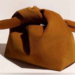 MERIT Elegant Tan Knot Cosmetics Bag